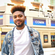 Broadway stage manager Cody Renard Richard stands outside the August Wilson Theatre, where Pass Over is one of several Black-led productions reopening Broadway this season.
